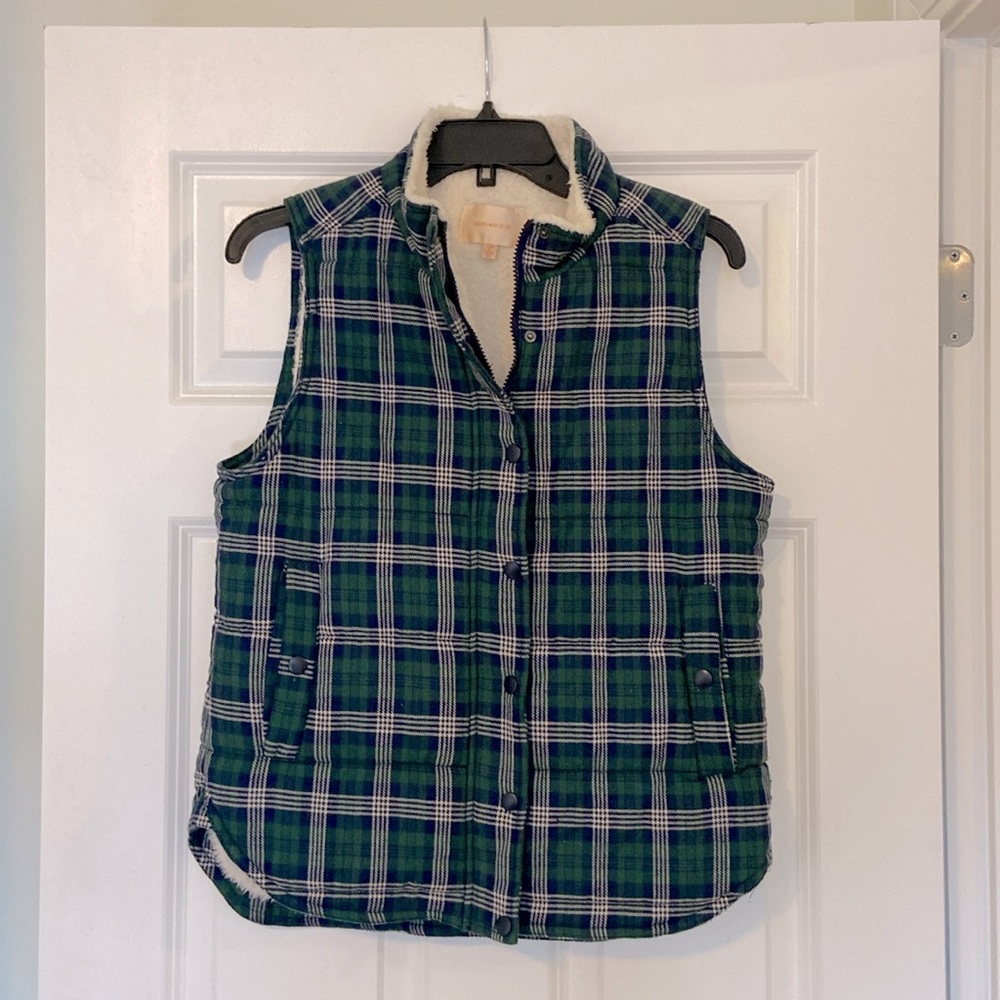 Skies Are Blue blue-green plaid, white fur lined vest.
